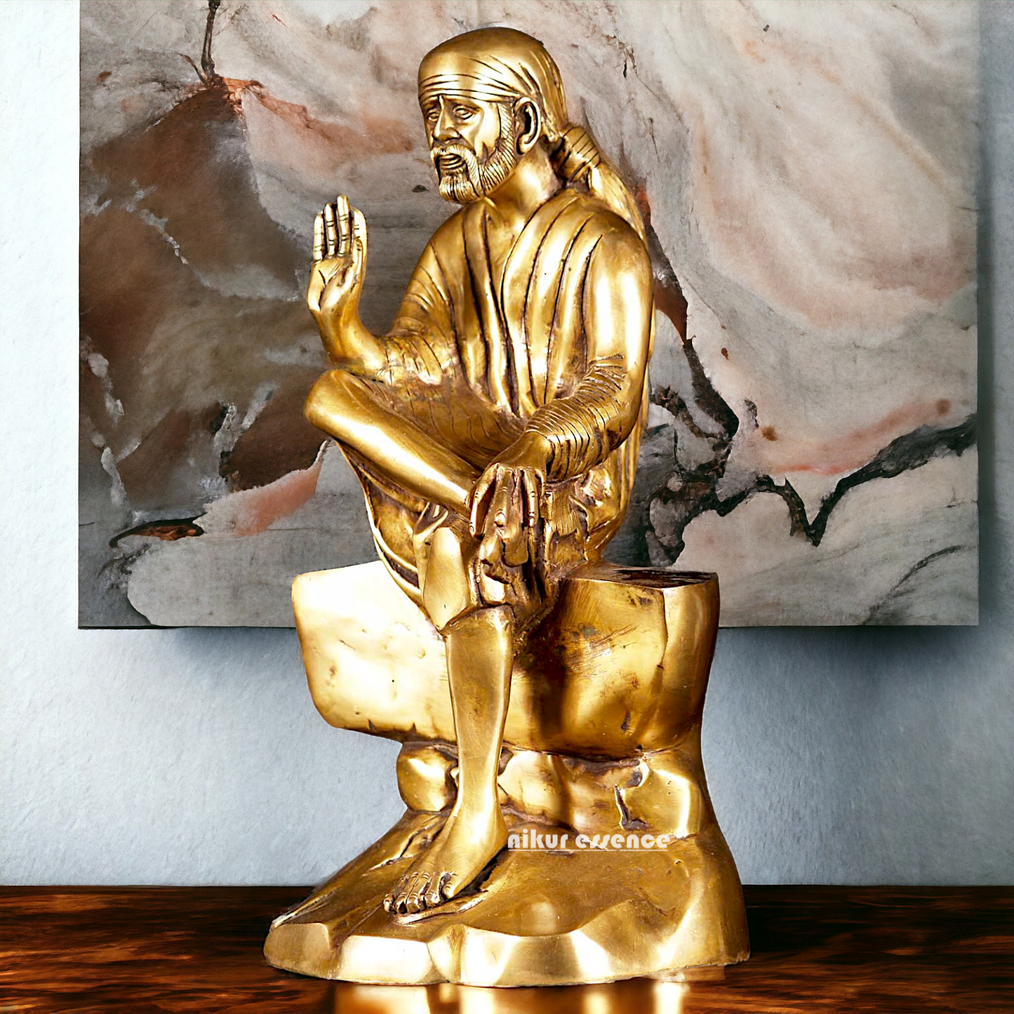 Pure Brass Sai Baba Sitting on Stone idol - 12 inches