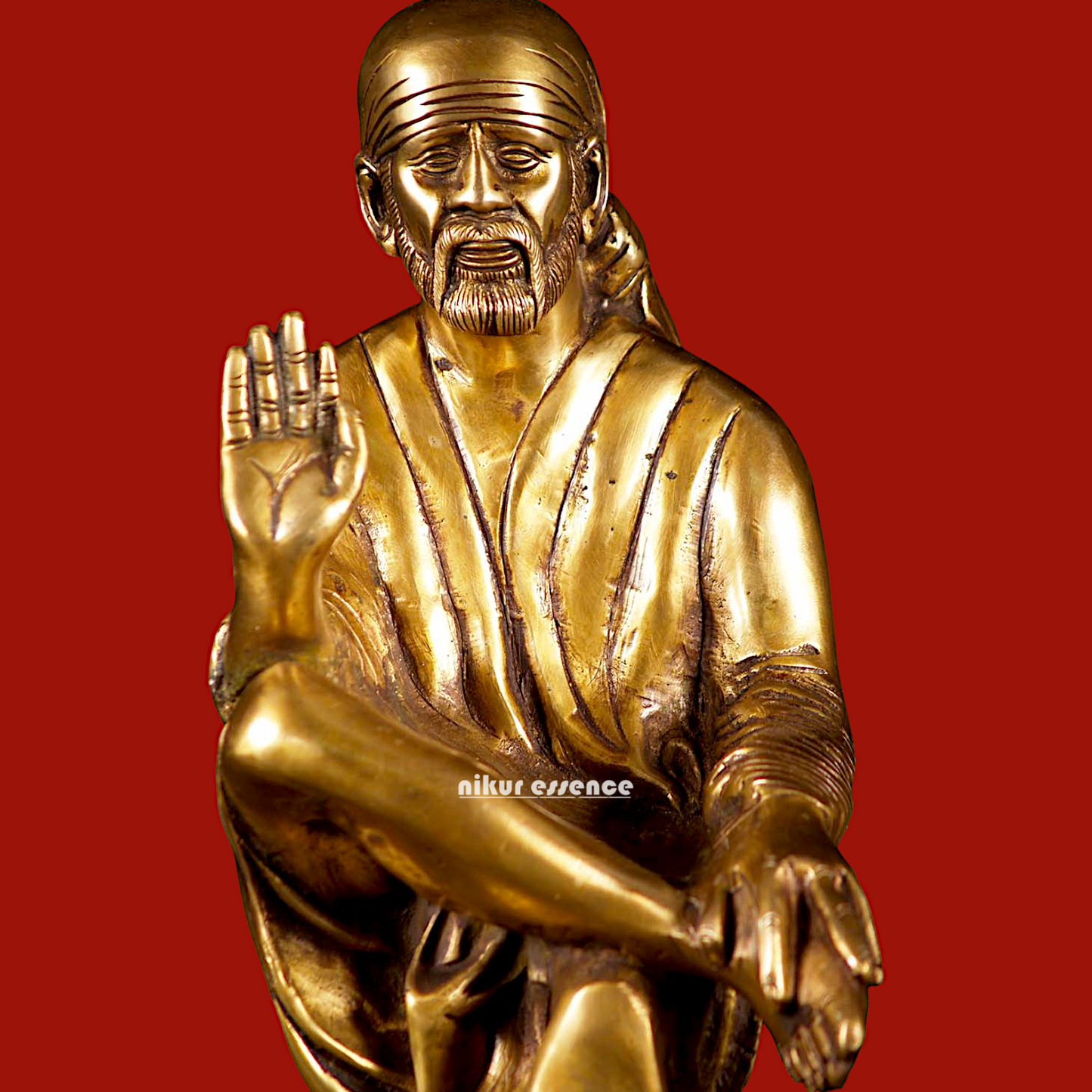 Pure Brass Sai Baba Sitting on Stone idol - 12 inches