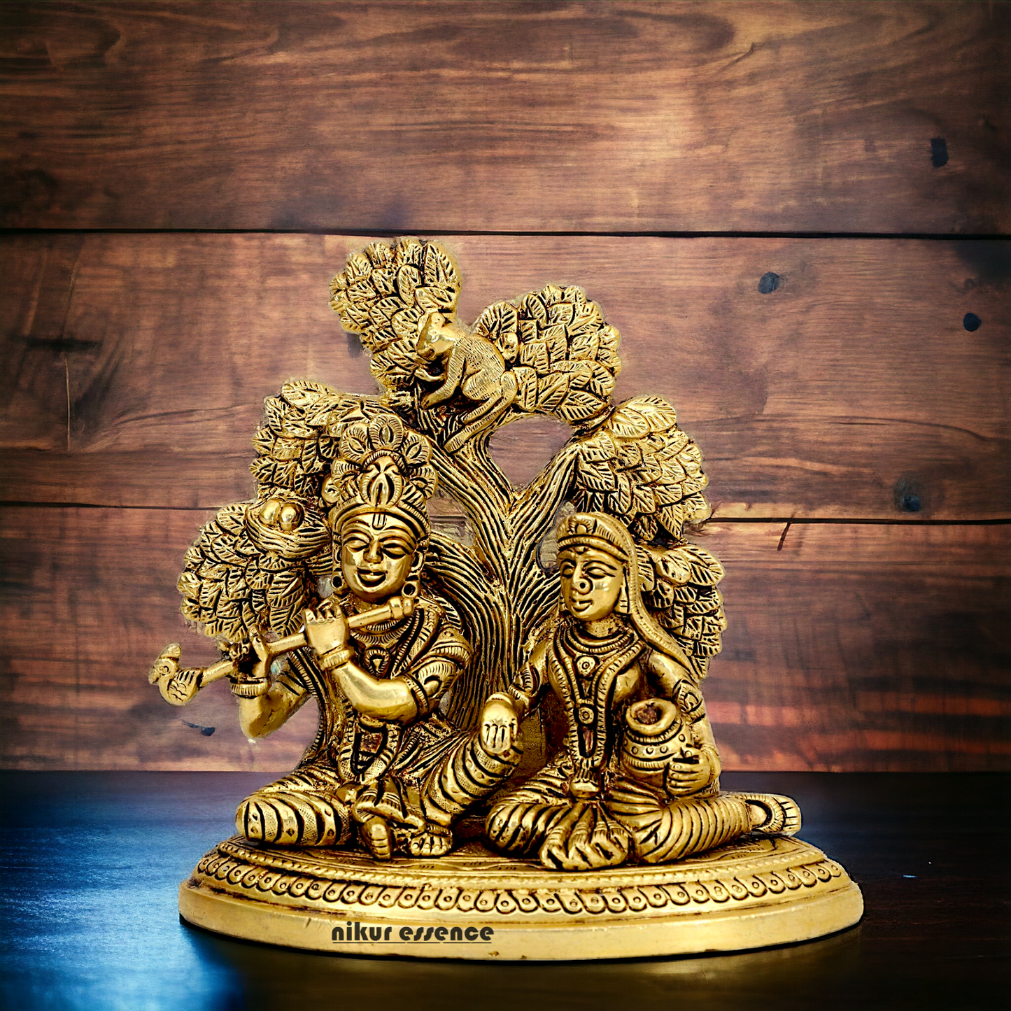 Shop Radha Krishna Sitting with Tree solid Brass idol - 5.5 inch