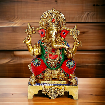 Buy Ganesha Ganesha Sitting Brass with Stone Work statue - 11 inch