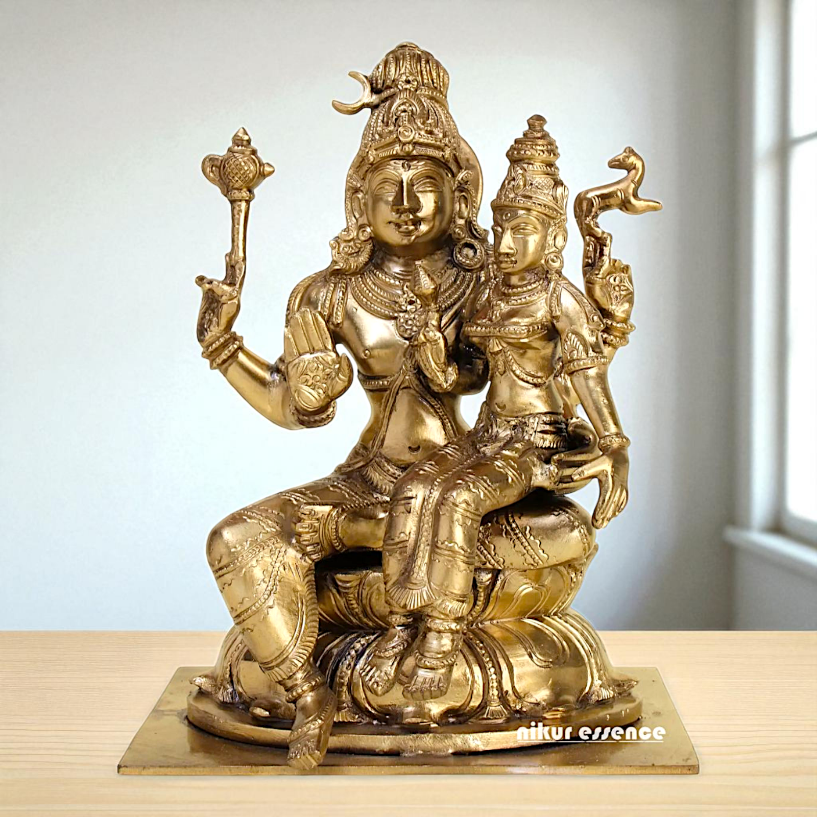 Pashupatinath shiva with Goddess Parvati Devi seated Blessing Bronze/Panchaloha idol - 8 Inches Nikuressence