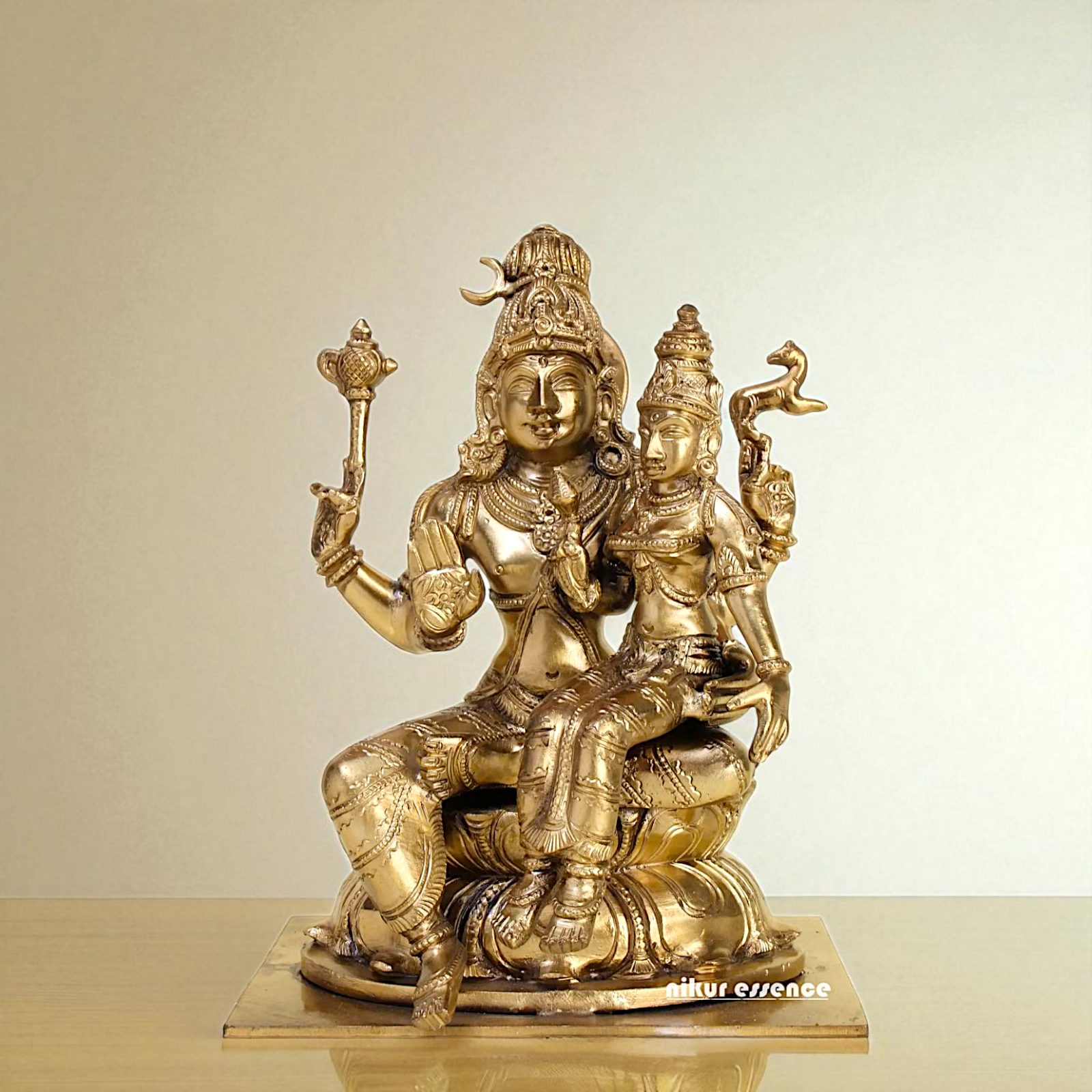 Pashupatinath shiva with Goddess Parvati Devi seated Blessing Bronze/Panchaloha idol - 8 Inches Nikuressence