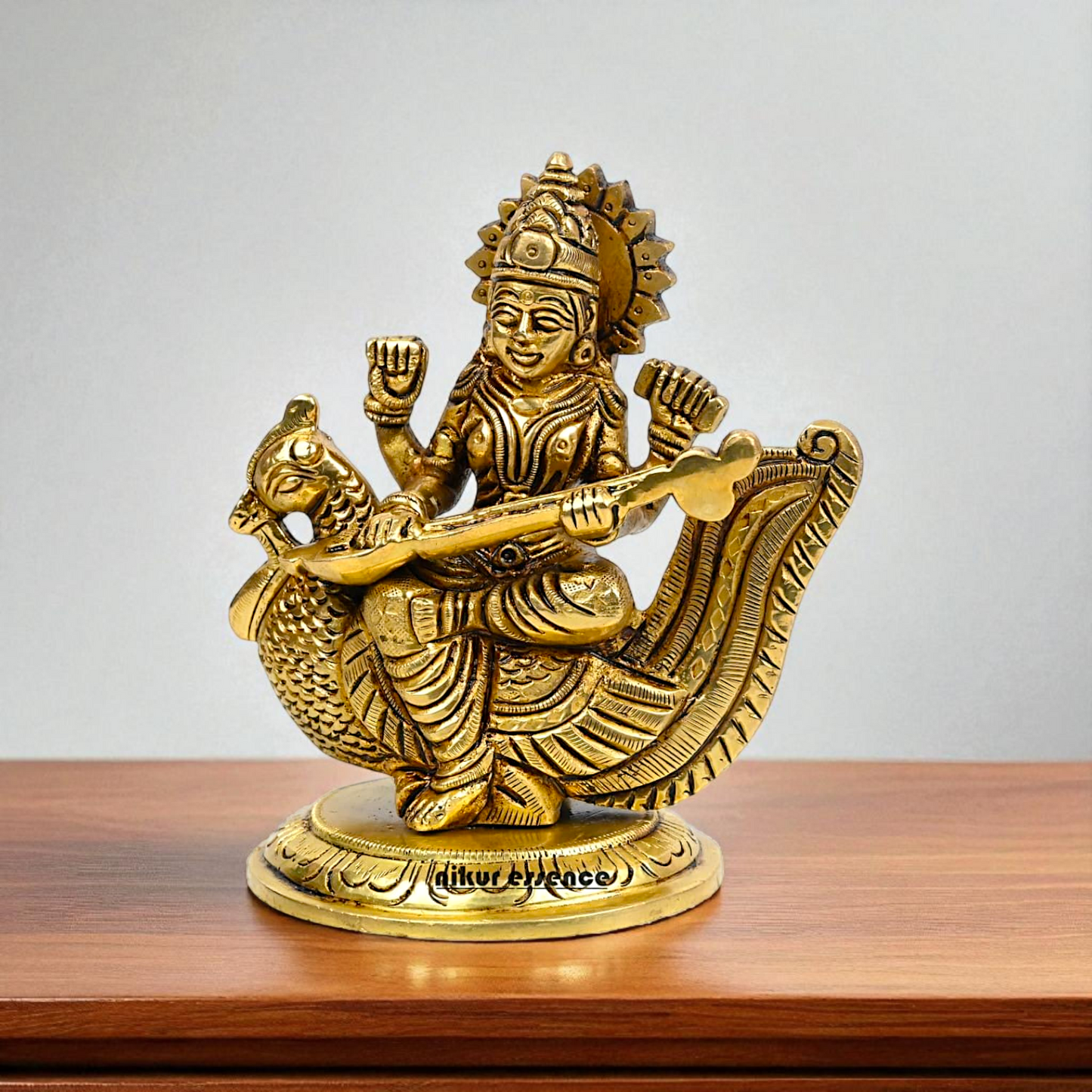 Goddess Saraswati Maa Seated on swan with Playing veena brass idol - 4 Inches Nikuressence