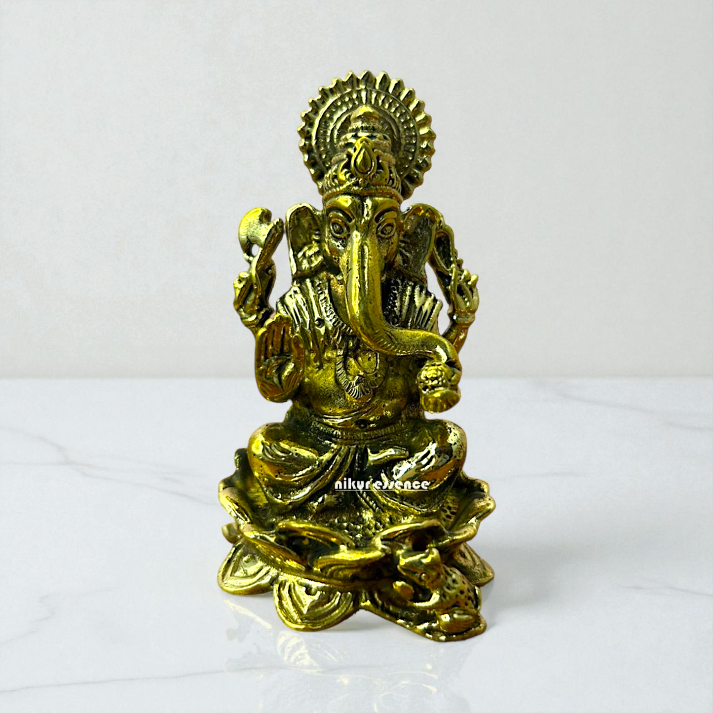 Ganesha Seated on Lotus Panchaloha Idol by Nikur Essence | Handcrafted Sacred Metal Sculpture Nikuressence