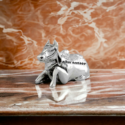 Sacred Cow in Silver in sitting position