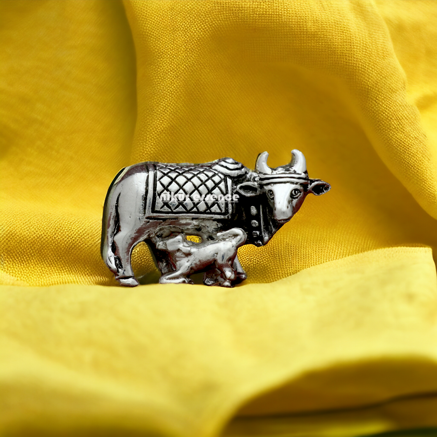 Silver Cow Idol with little calf