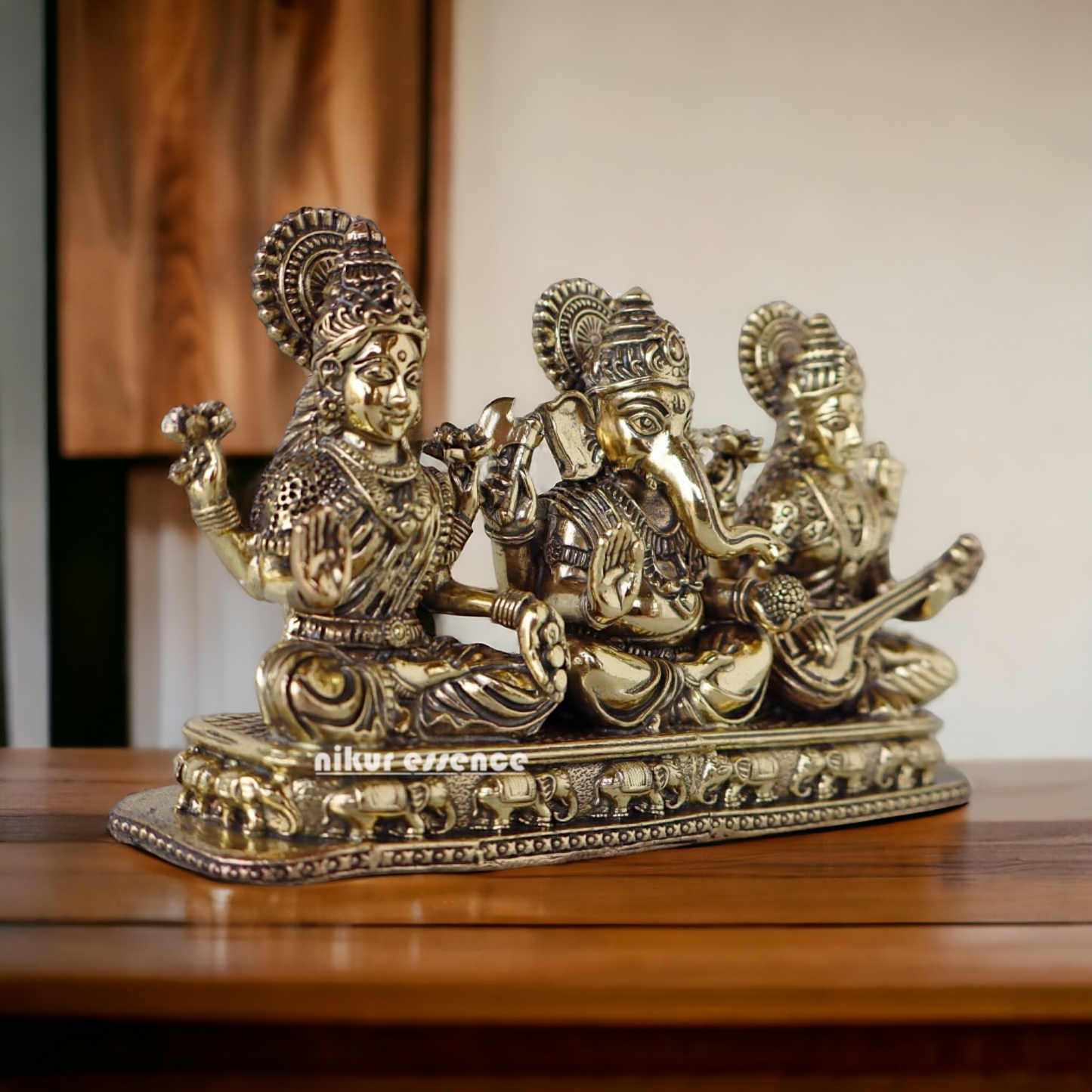 Buy Superfine Brass Ganesh Lakshmi Saraswati Sitting Idol - 2.756 inches