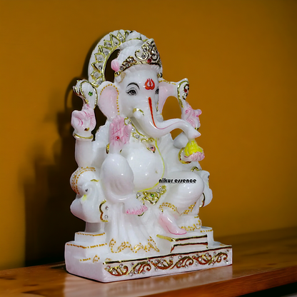 Marble Ganesha seated idol - 9 inches