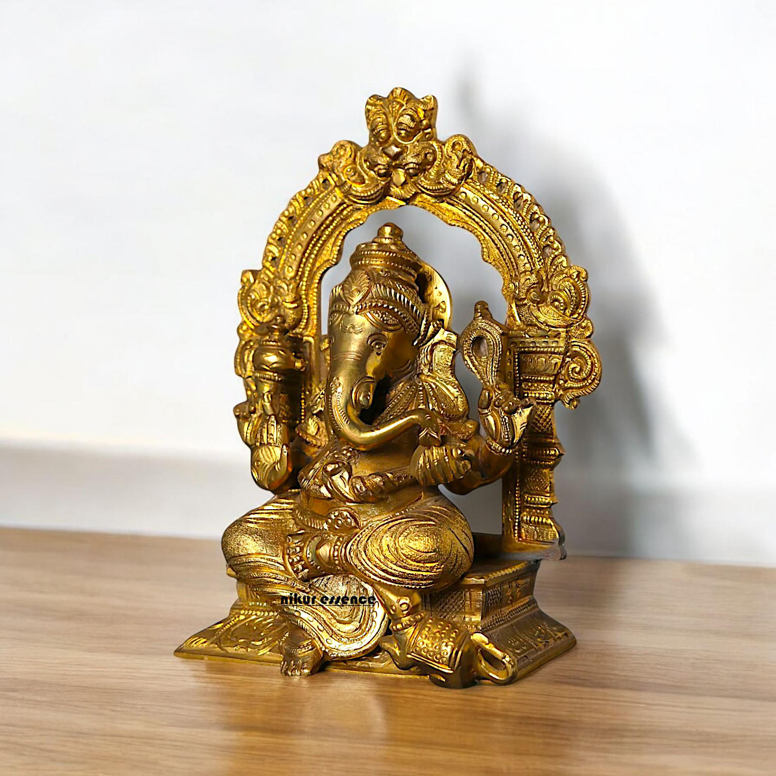 Ganesha seated on singhasan Panchaloha idol - 7 Inches Nikuressence