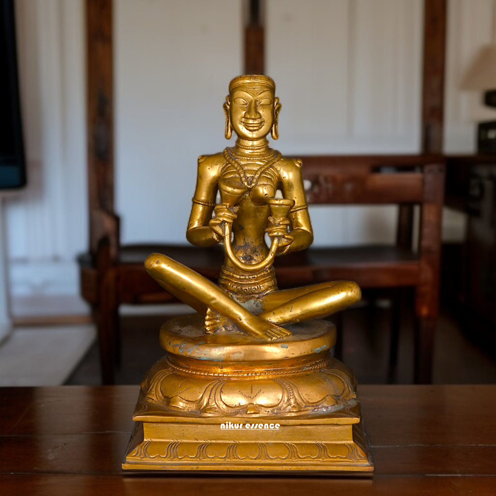 Karaikal Ammaiyar seated Panchaloha idol - 10 inches