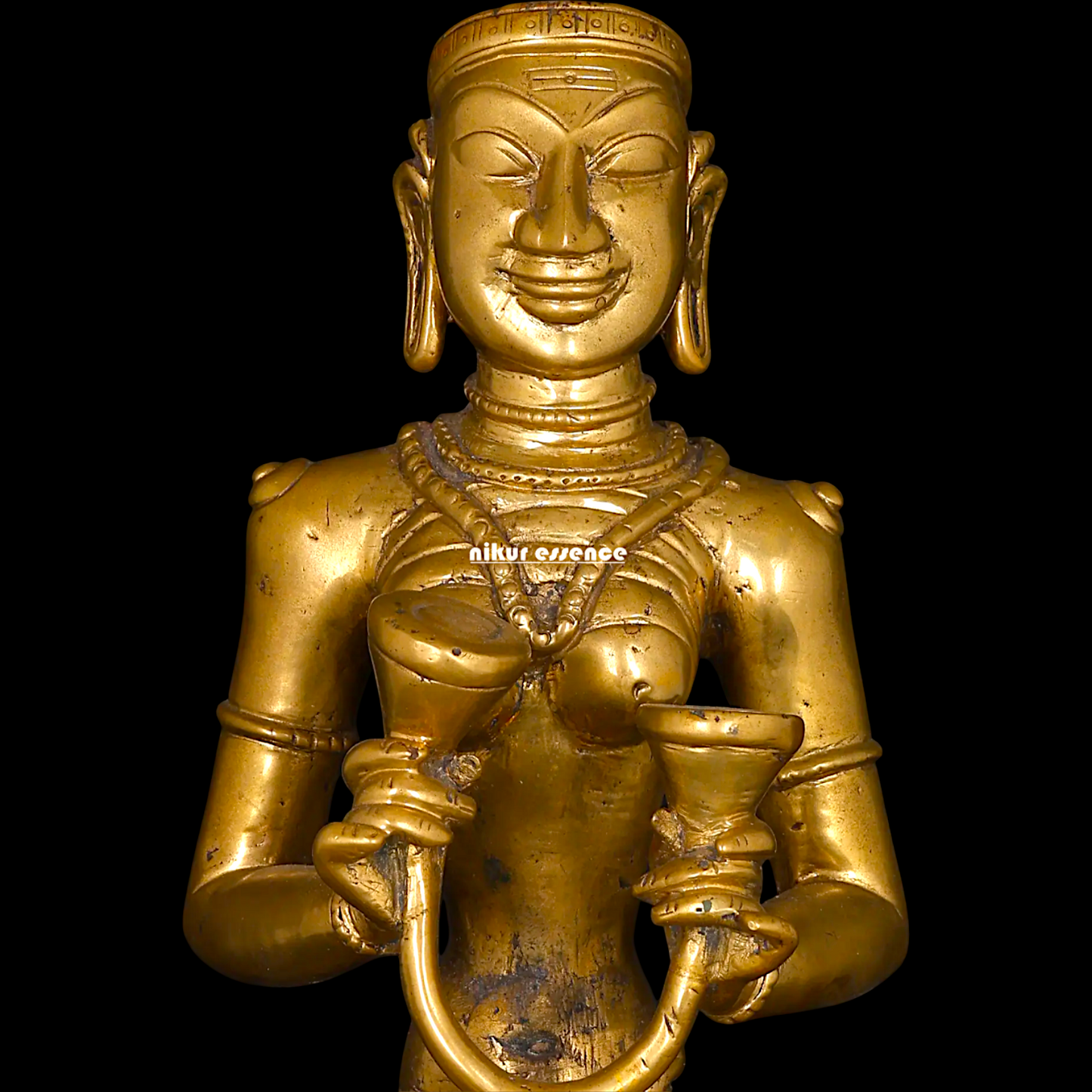 Karaikal Ammaiyar seated Panchaloha idol - 10 inches