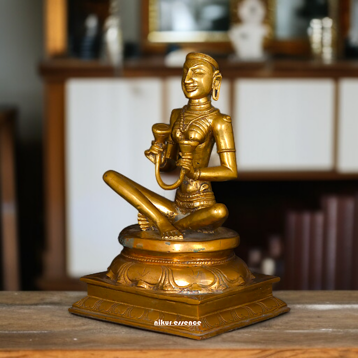 Karaikal Ammaiyar seated Panchaloha idol - 10 inches