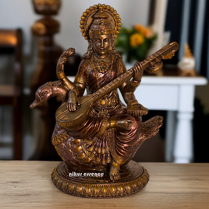 Large Saraswati seated on swan with Playing Veena Bronze Idol - 8.26 Inches