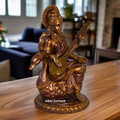 Large Saraswati seated on swan with Playing Veena Bronze Idol - 8.26 Inches