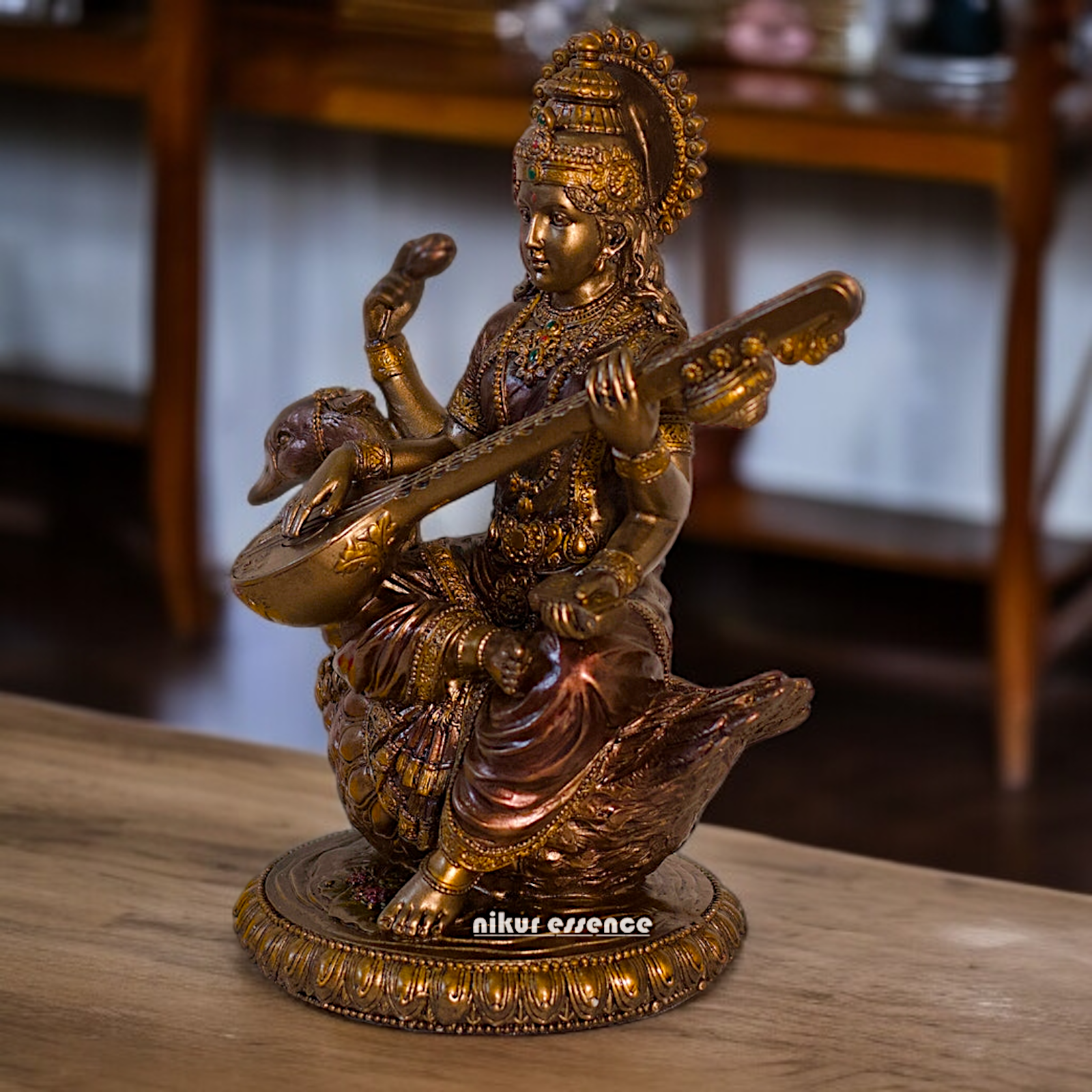 Large Saraswati seated on swan with Playing Veena Bronze Idol - 8.26 Inches