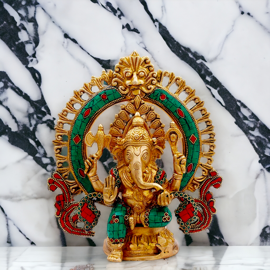 Buy Ganesha Sitting Brass with Stone Work statue - 9 nches