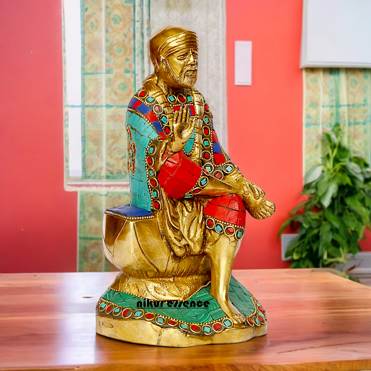 Lord Sai Baba Sitting Idol with Stone Work - 8 Inches