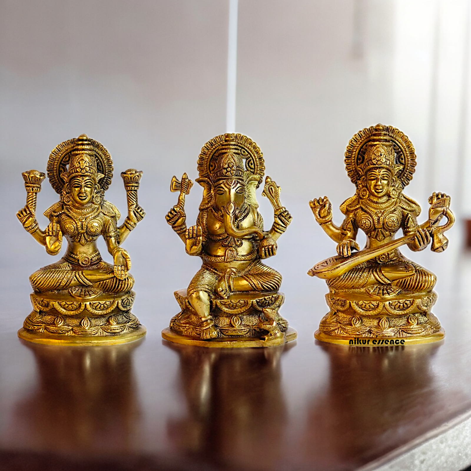 Buy Brass Lakshmi Ganesh Saraswati Beautiful Idol - 7 inches