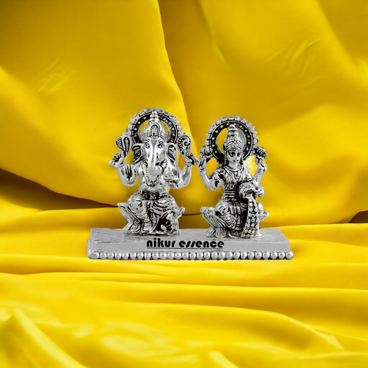 Buy Pure Silver Ganesh Laxmi statue Nikuressence AltarDecor AuspiciousIdol BhaktiGifts DevotionalIdols DivineBlessings GaneshBhakti GaneshLaxmiIdol GoodFortuneIdol HandcraftedIdols HinduGods HinduIdols HinduRituals HomeTemple LaxmiBhakti LuxuryIdols Meditation NikurEssenceSilver ProsperityIdol PujaRoom SilverGaneshLaxmi SilverIdol SilverIdols SpiritualConnection SpiritualDecor SpiritualGifts SpiritualGrowth SpiritualPractice Worship