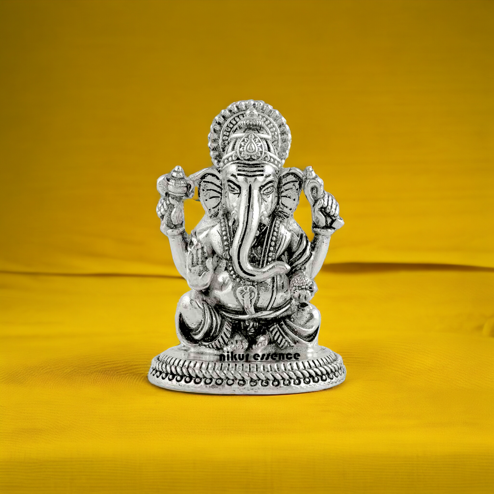 Buy Pure Silver Ganesh Idol -nikuressence Nikuressence AltarDecor DivineBlessing FaithAndSpirituality GaneshBhakti GaneshIdol HandcraftedIdols HandcraftedSilver HinduArt HinduDevotee HinduGods HinduRituals HomeTemple IndianArt LuxuryDecor NikurEssenceSilver PujaRoom SilverDecorItems SilverGaneshIdol SilverIdol SilverIdols SpiritualDecor SpiritualGifts SpiritualGrowth SpiritualSignificance WisdomAndProsperity