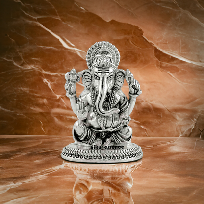 Buy Pure Silver Ganesh Idol -nikuressence Nikuressence AltarDecor DivineBlessing FaithAndSpirituality GaneshBhakti GaneshIdol HandcraftedIdols HandcraftedSilver HinduArt HinduDevotee HinduGods HinduRituals HomeTemple IndianArt LuxuryDecor NikurEssenceSilver PujaRoom SilverDecorItems SilverGaneshIdol SilverIdol SilverIdols SpiritualDecor SpiritualGifts SpiritualGrowth SpiritualSignificance WisdomAndProsperity