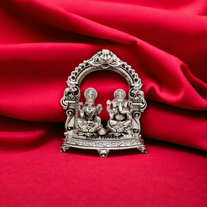 Buy Silver Laxmi Ganesh Idol online Nikuressence AltarDecor AuspiciousIdol BhaktiGifts DevotionalIdols DivineBlessings diwaligift DiwaliGifts GaneshBhakti GaneshLaxmi GoodFortuneIdol HandcraftedIdols HinduGods HinduIdols HinduRituals HomeTemple LaxmiBhakti LaxmiGaneshIdol LuxuryIdols Meditation Nikur Essence NikurEssenceSilver ProsperityIdol PujaRoom SilverIdol SilverIdols SilverLaxmiGanesh SpiritualConnection SpiritualDecor SpiritualGifts SpiritualGrowth SpiritualPractice Worship