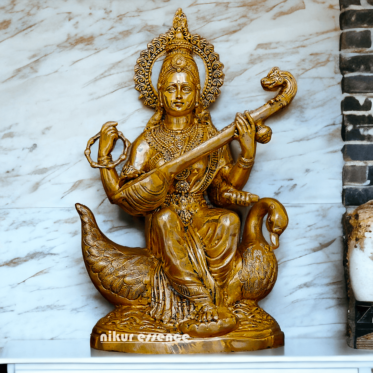 Statue of Hindu in brass Maa Saraswati, Depicted Riding a Swan and Playing the Veena, Symbolizing Wisdom, Arts, and Learning in Hindu Mythology