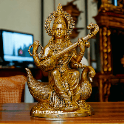 Statue of Hindu in brass Maa Saraswati, Depicted Riding a Swan and Playing the Veena, Symbolizing Wisdom, Arts, and Learning in Hindu Mythology