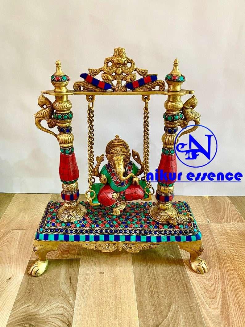 Ganesha Swing Brass Statue with Breathtaking Stone Work, Delicate Patterns, and a Serene Expression